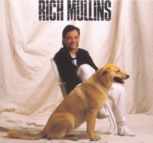rich mullens smiles with his dog for album cover